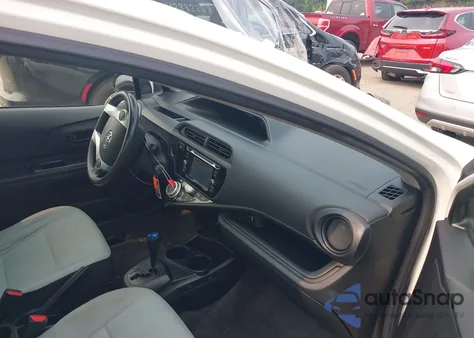 2017 Toyota Prius C One from USA, damaged, VIN JTDKDTB34H1592028